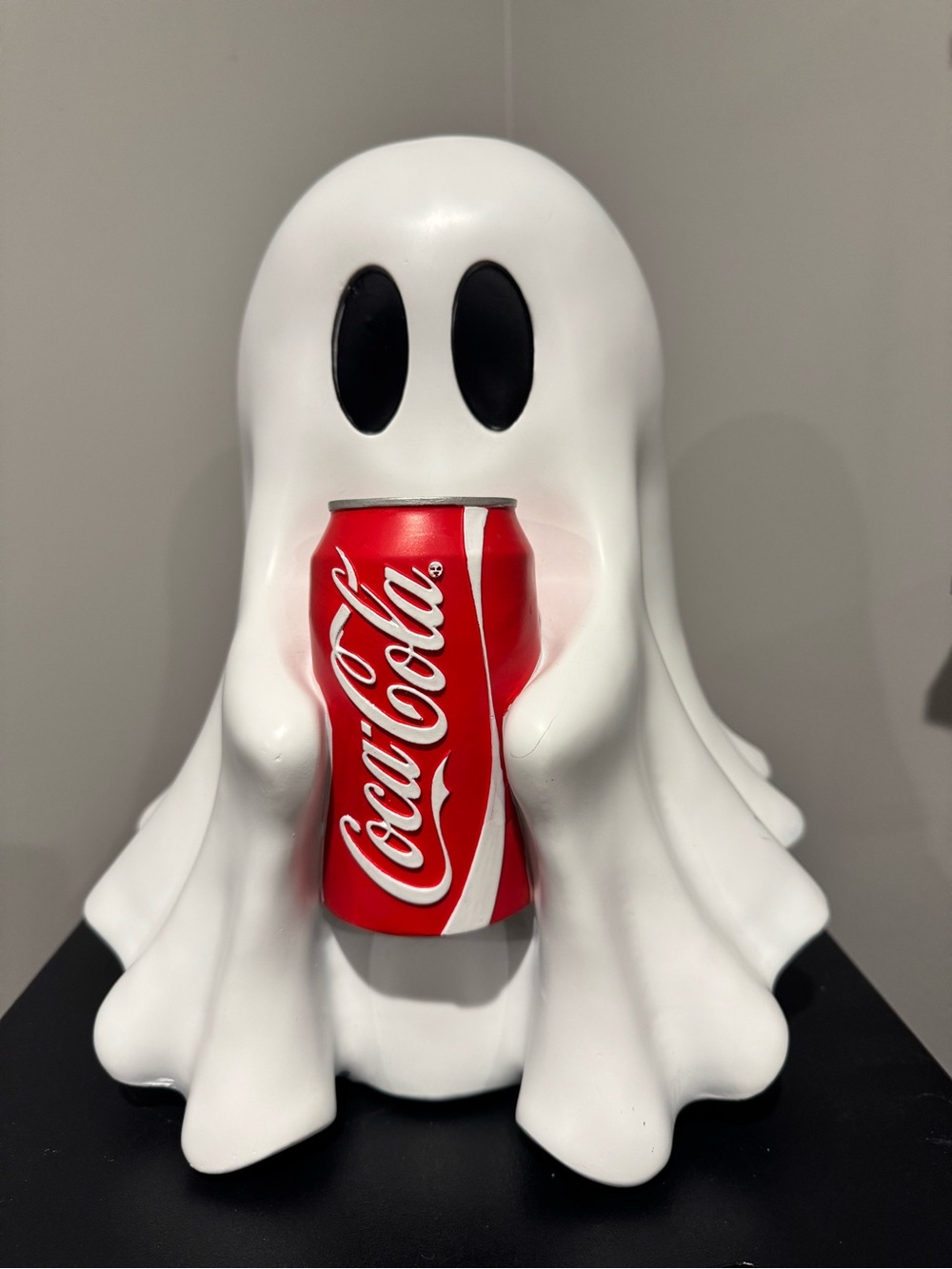 Coca-Cola White Ghost Figurine with Red Can